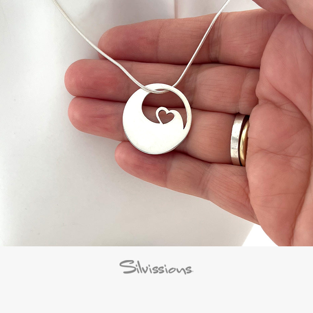 sterling-silver-hear-pendant-necklace-P-16-girl--height-1000-width-1000