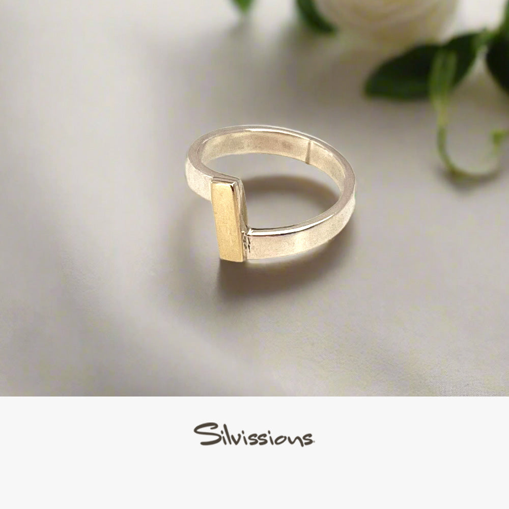 Silver with Gold accents ring on a light gray surface with 'Silvissions' branding.