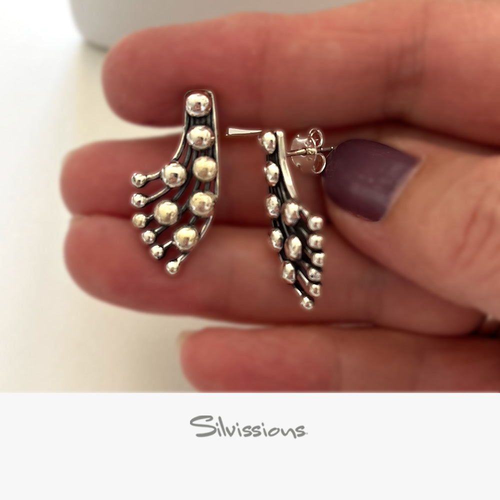 sterling-silver-stud-earrings-for-women-E-61-hand-height-1000-width-1000