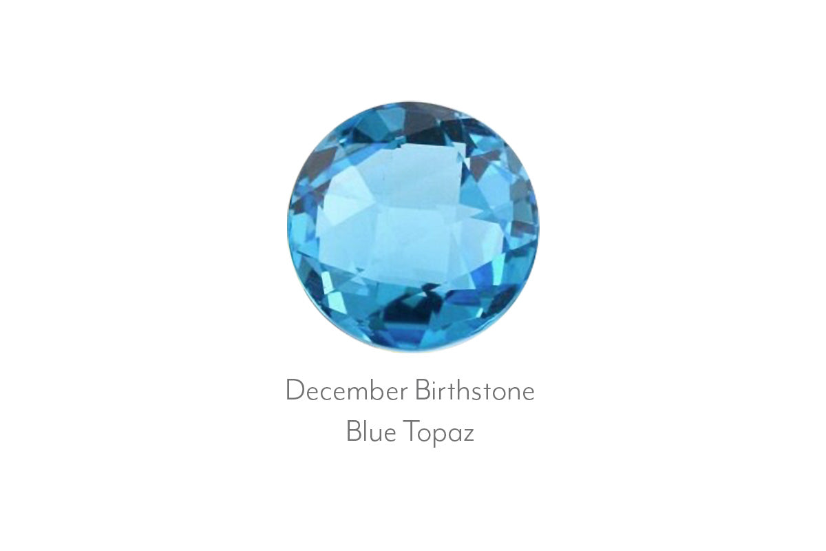 Blue topaz gemstone on a white background with 'December Birthstone' text.