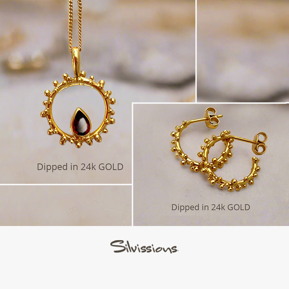 Gold necklace and earrings with 'Dipped in 24k Gold' text, featuring the Silvissions brand.