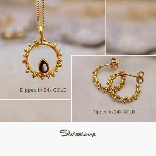 Gold necklace and earrings with 'Dipped in 24k Gold' text, featuring the Silvissions brand.