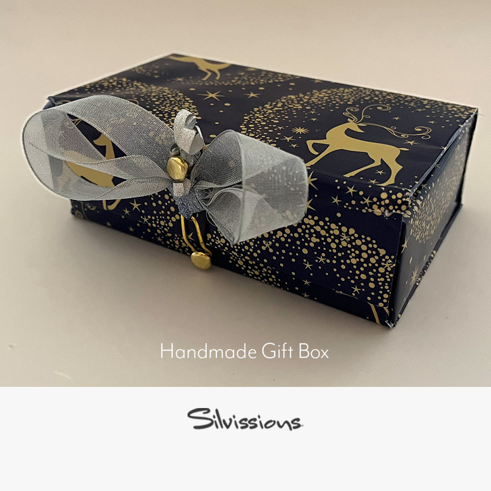 Handmade gift box with decorative ribbon and 'Silvissions' branding.