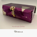 Handmade gift box with gold accents on a neutral background, branded 'Silvissions'.