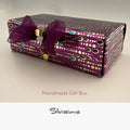 Handmade gift box with decorative bow on a neutral background, branded 'Silvissions'.
