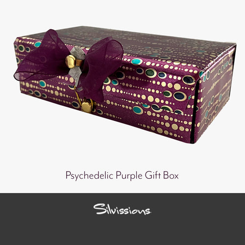 Purple gift box with decorative bow on a white background, featuring the brand 'Silvissions'.