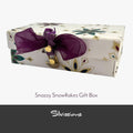 Gift box with decorative ribbon and 'Silvissions' branding