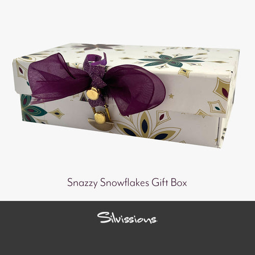 Gift box with decorative ribbon and 'Silvissions' branding