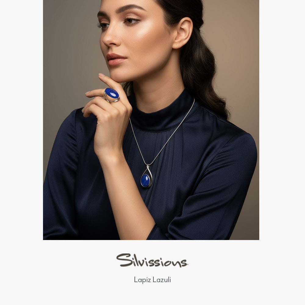 Woman wearing blue gemstone jewelry with 'Silvissions' branding
