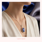 Necklace with a lapis lazuli pendant on a woman against a satin fabric background, featuring the brand 'Silvissions'.