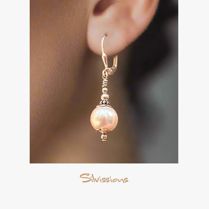 pearl-drop-earrings-handmade-in-sterling-silver-E-59-girl-height-1000-width-1000