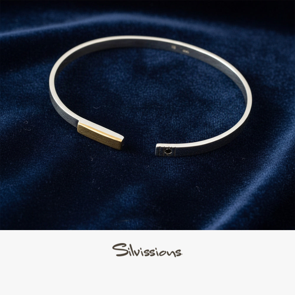 Handmade Sterling Silver Bangle Bracelet with a Gold Accent