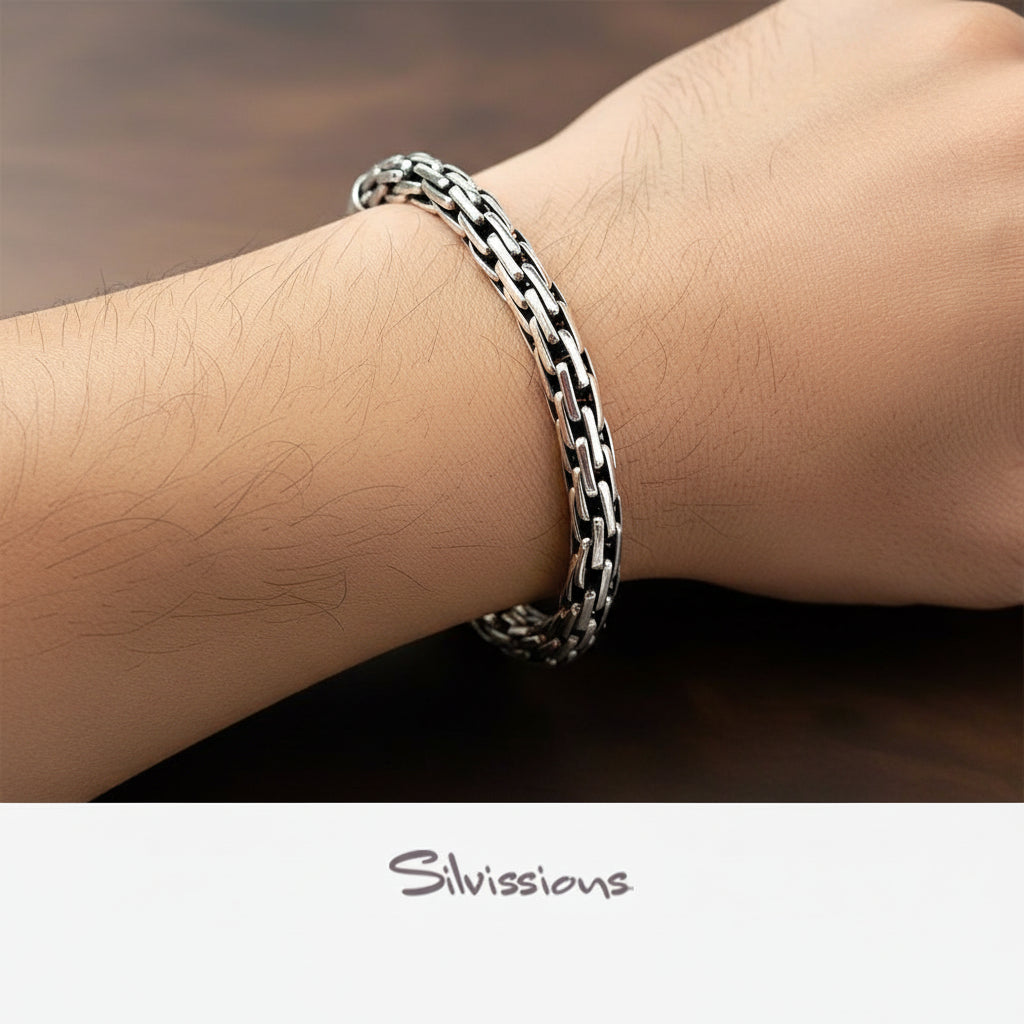 Sterling Silver bracelet on a wrist with 'Silvissions' branding.
