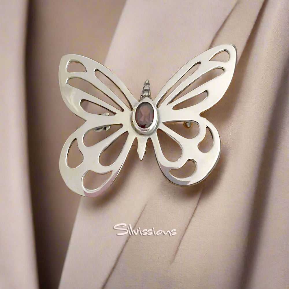 Handcrafted Butterly Brooch in Sterling Silver with a Red Garnet Gemstone