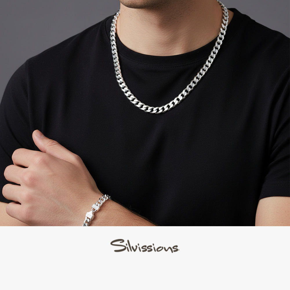 Person wearing a sterling silver cuban chain necklace and bracelet with 'Silvissions' branding.