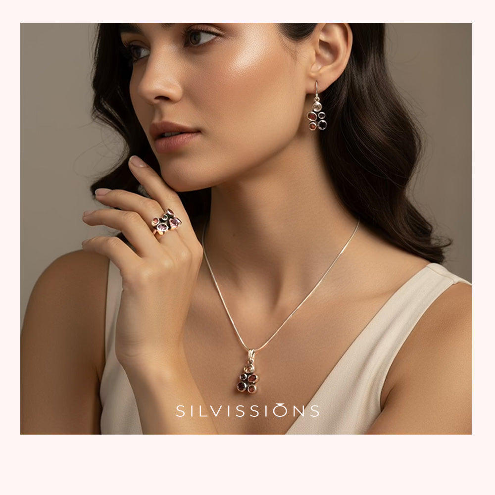 Woman wearing jewelry with 'Silvassions' branding