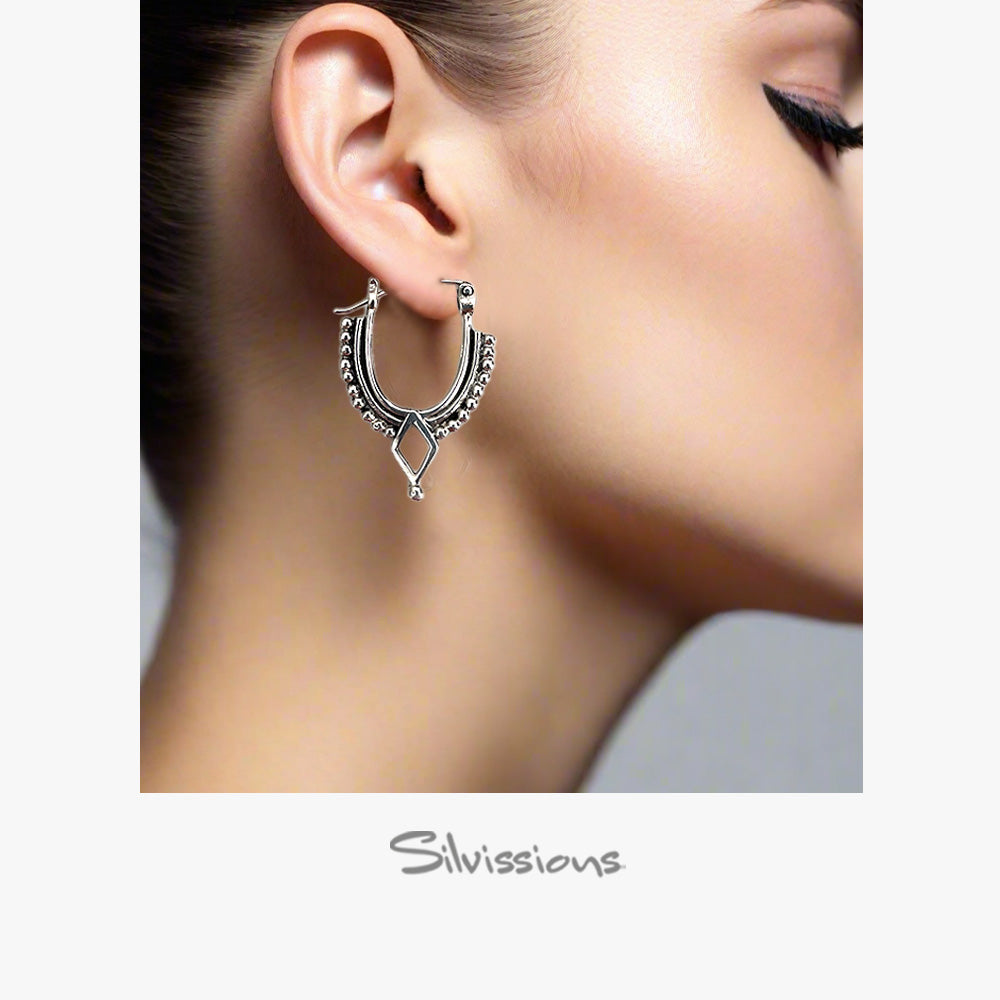 sterling-silver-hoop-earrings-handcrafted-silvissions-jewelry.com-E-31-girl-height-1000-width-1000