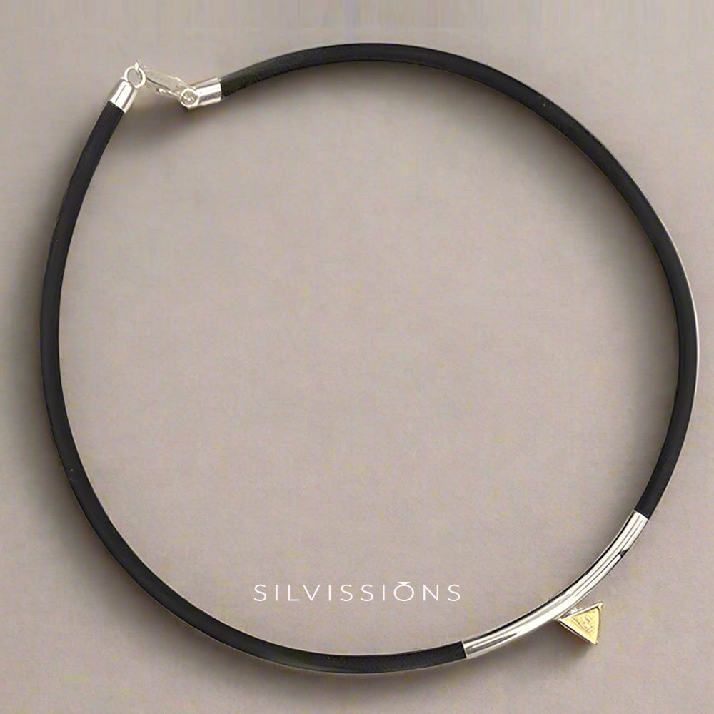 Black choker necklace with silver clasp on a gray background, featuring the brand 'Silvissions'.