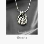 Silver pendant on a gray background with 'Silvissions' branding.
