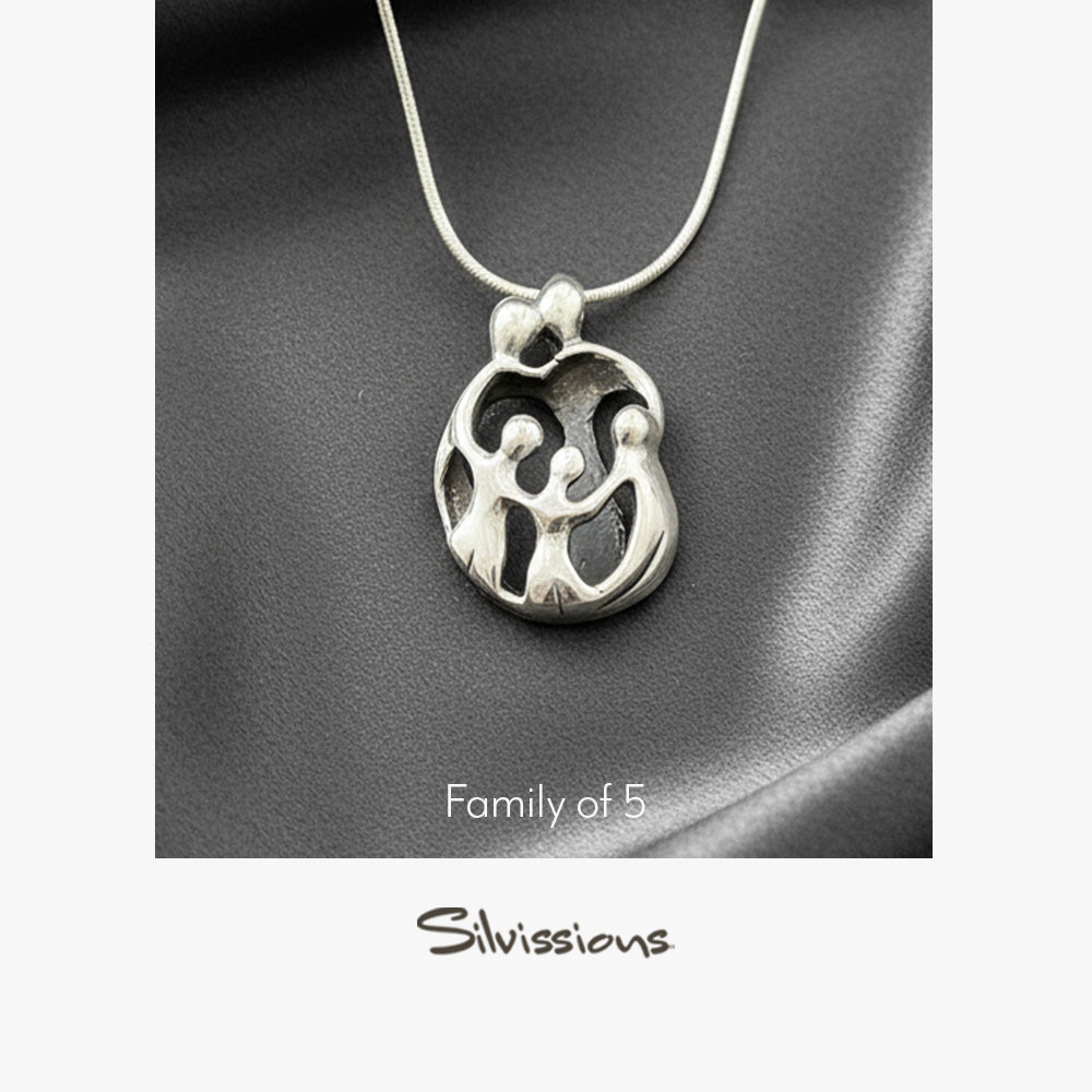 Silver pendant on a gray background with 'Silvissions' branding.