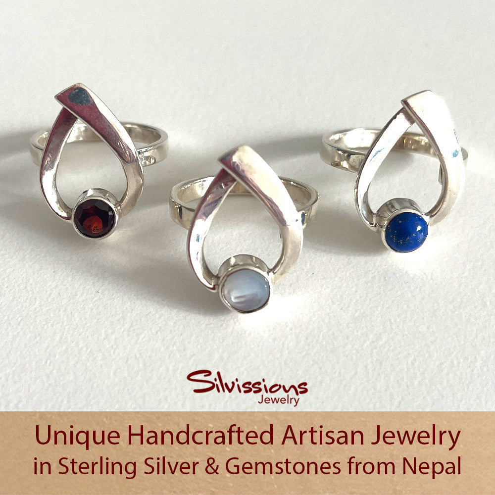 Sterling Silver Rings handcrafted as Cross Over Ribbons with round cut Gemstones